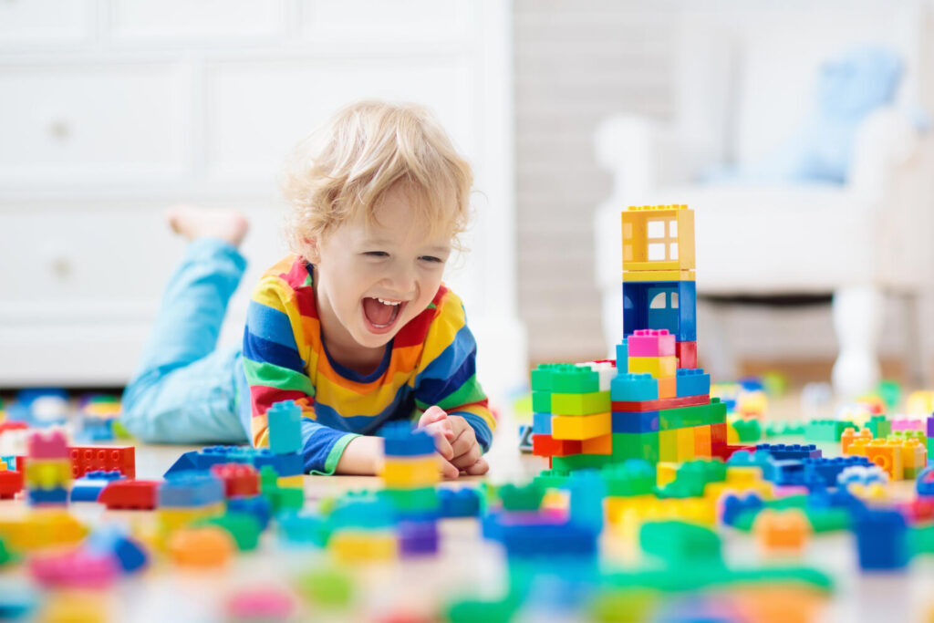 toddler playing with toys